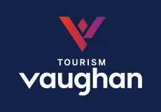 The Tourism Vaughan logo on a dark blue background with a red-purple V.