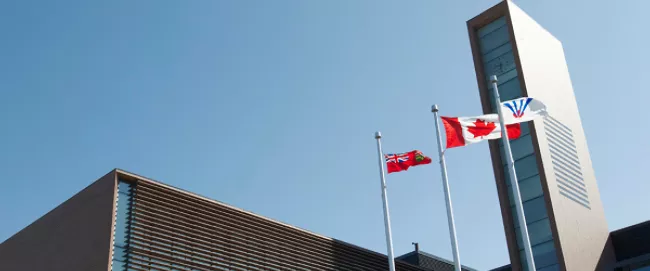 A view of the flags raised in front of Vaughan City Hall.