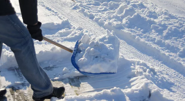 A person shoveling snow.