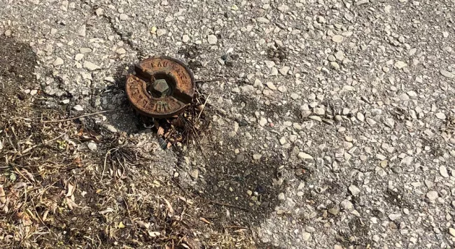 a curb box in the road