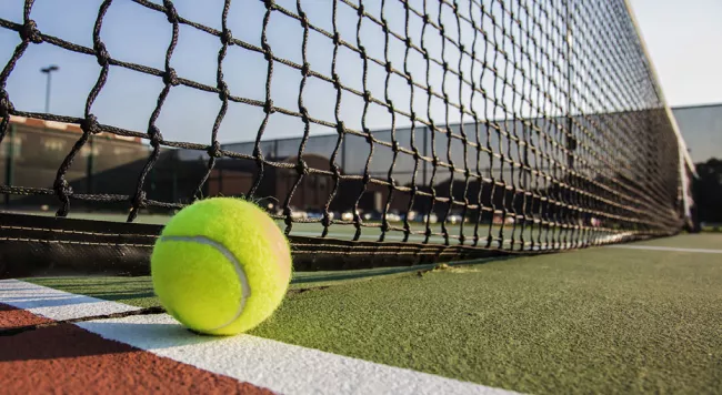 Tennis ball on a tennis court