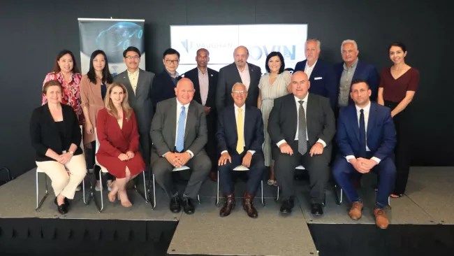 Mayor Steven Del Duca sitting with a group