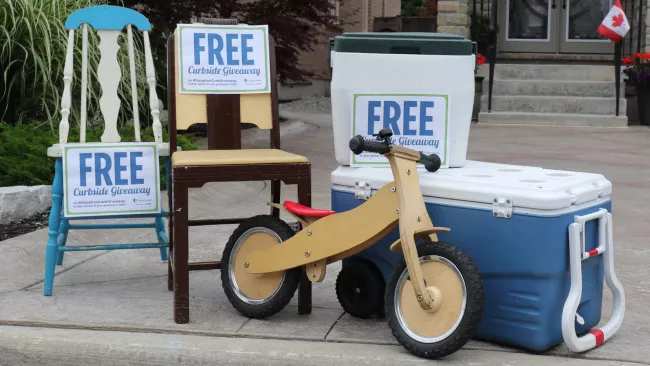 chairs, coolers and a tricycle