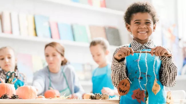 Kids doing fall crafts