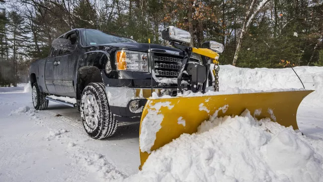 Snowplow pushing snow