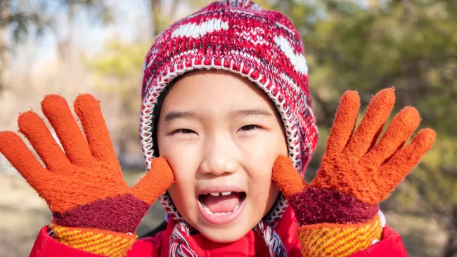 Happy kid making a silly face