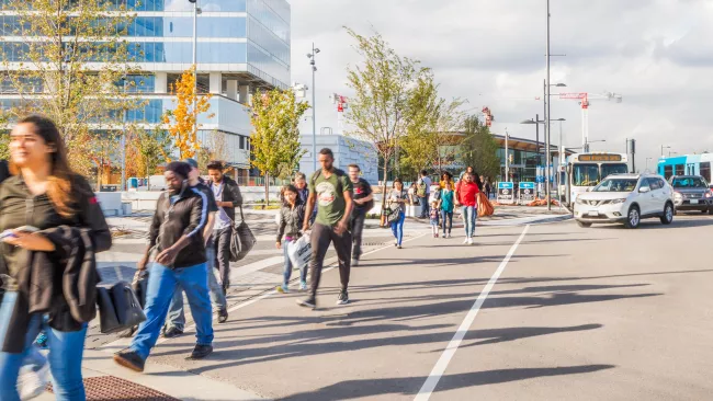 People crossing the street in the VMC