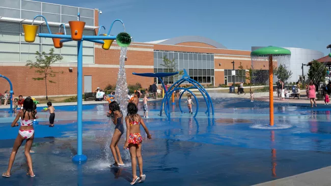 Kids playing in one of the City's splashpads