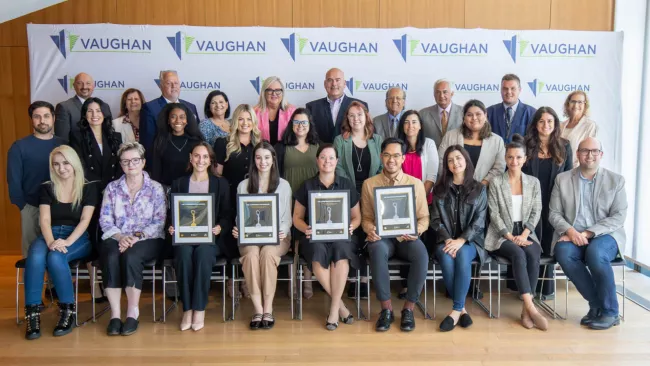 Mayor and Council with the City's Communications, Marketing and Engagement team and their four awards