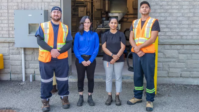 four staff members from the stormwater and wastewater services team