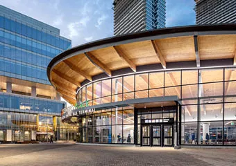 An image of the transit station in the VMC with buildings surrounding it.