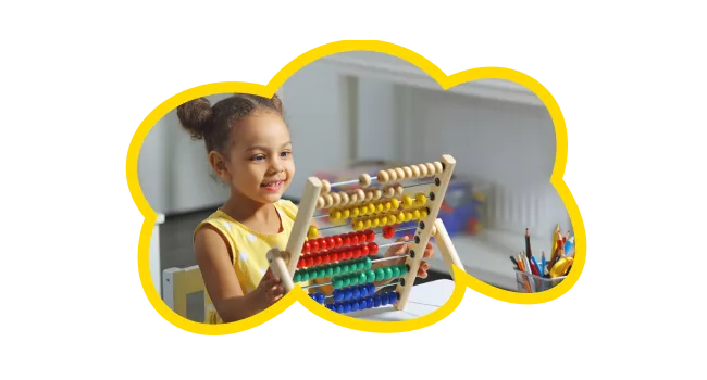 Mixed race child playing with counting toy